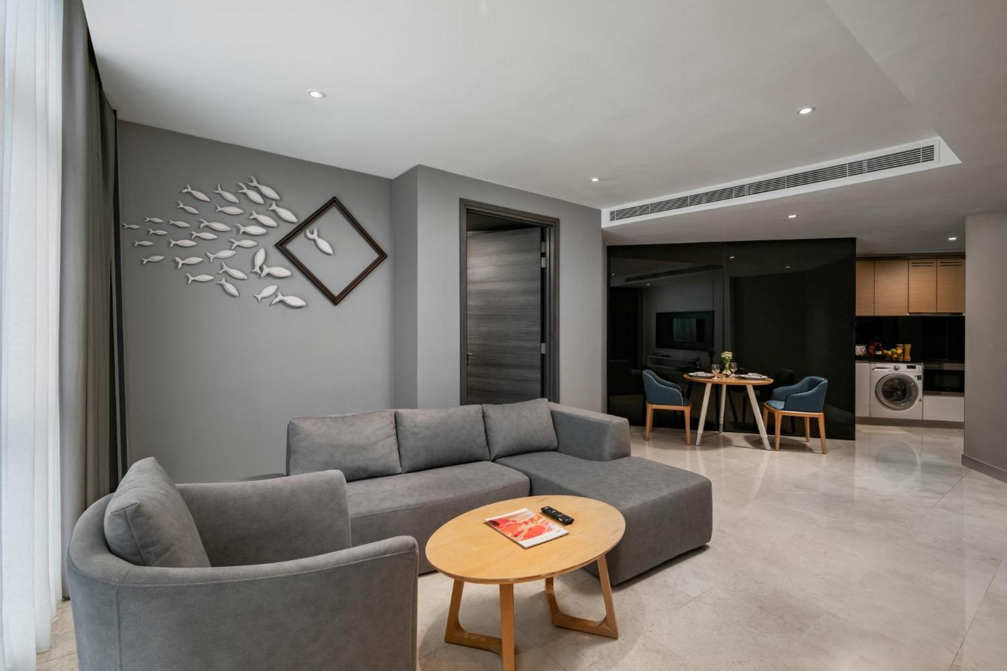 Fraser Place Puteri Harbour Nusajaya  Extérieur photo A living room in a serviced apartment in Singapore